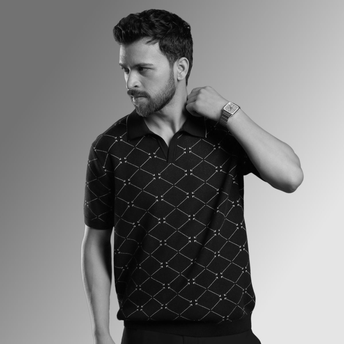 guy wearing a black polo t-shirt