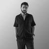 THE TEXTURED HALF-SLEEVE FLAT-KNIT BLACK SHIRT