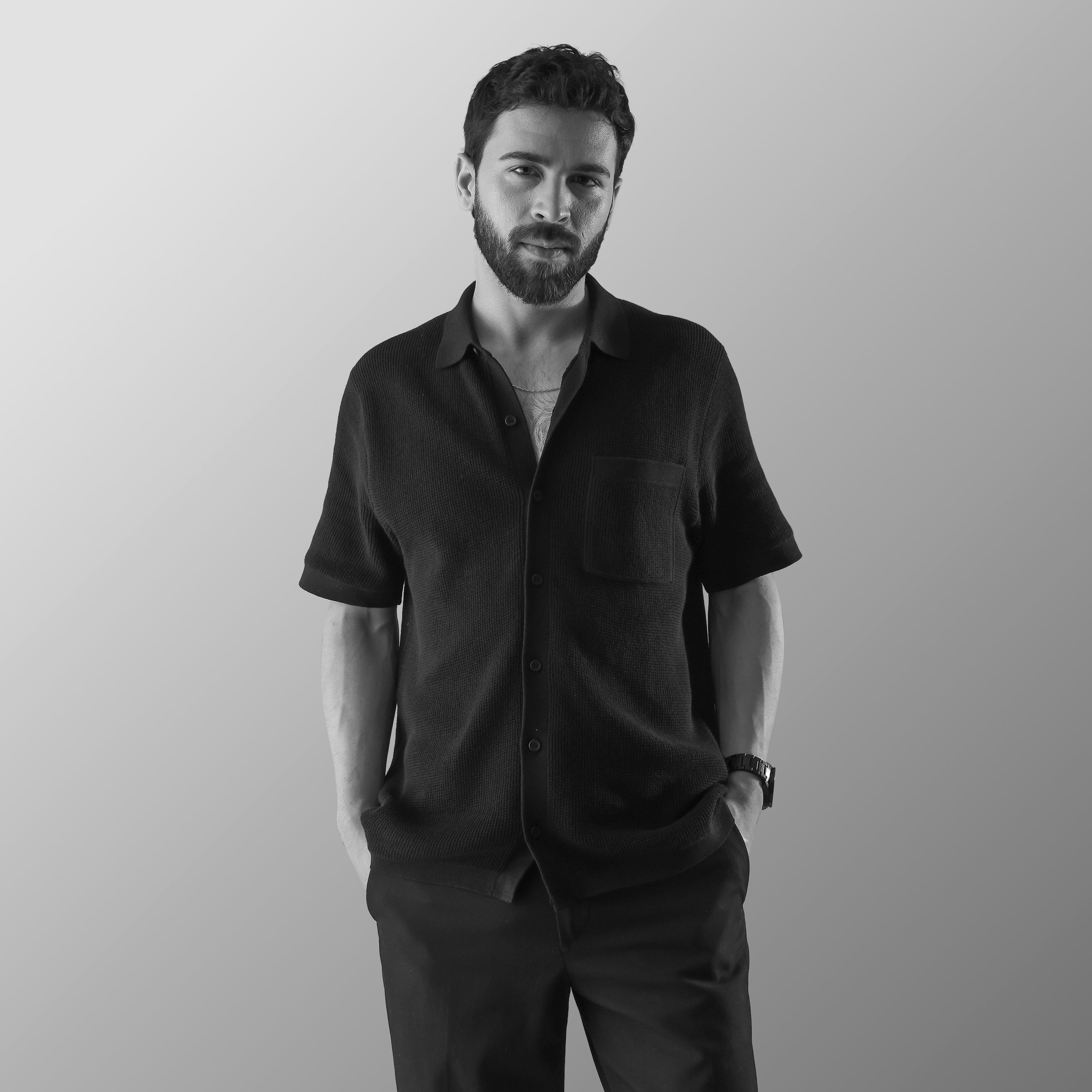 THE TEXTURED HALF-SLEEVE FLAT-KNIT BLACK SHIRT