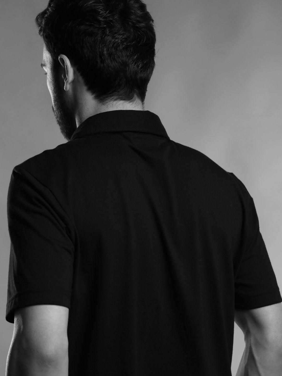 CLASSIC BLACK GOLF SHIRT WITH STRIPES