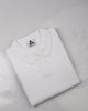 MINIMALIST, TEXTURED PINNACLE POLO