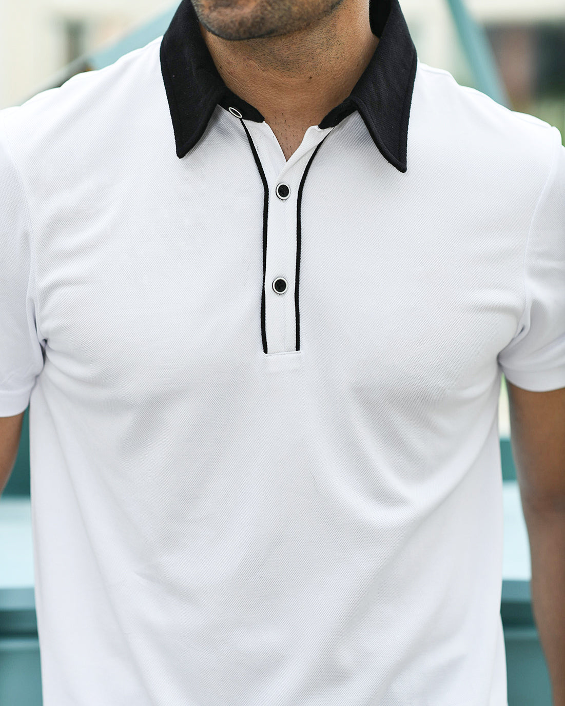 BUTTONED WHITE PINNACLE POLO